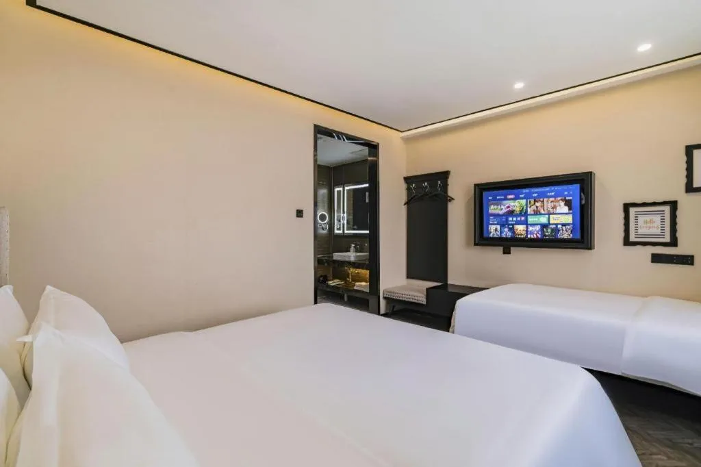 Bed in Xana Lite Hotelle Tianjin Huaming Binhai International Airport