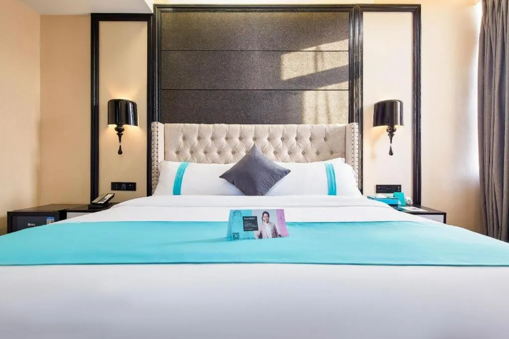 Bed in Xana Lite Hotelle Tianjin Huaming Binhai International Airport