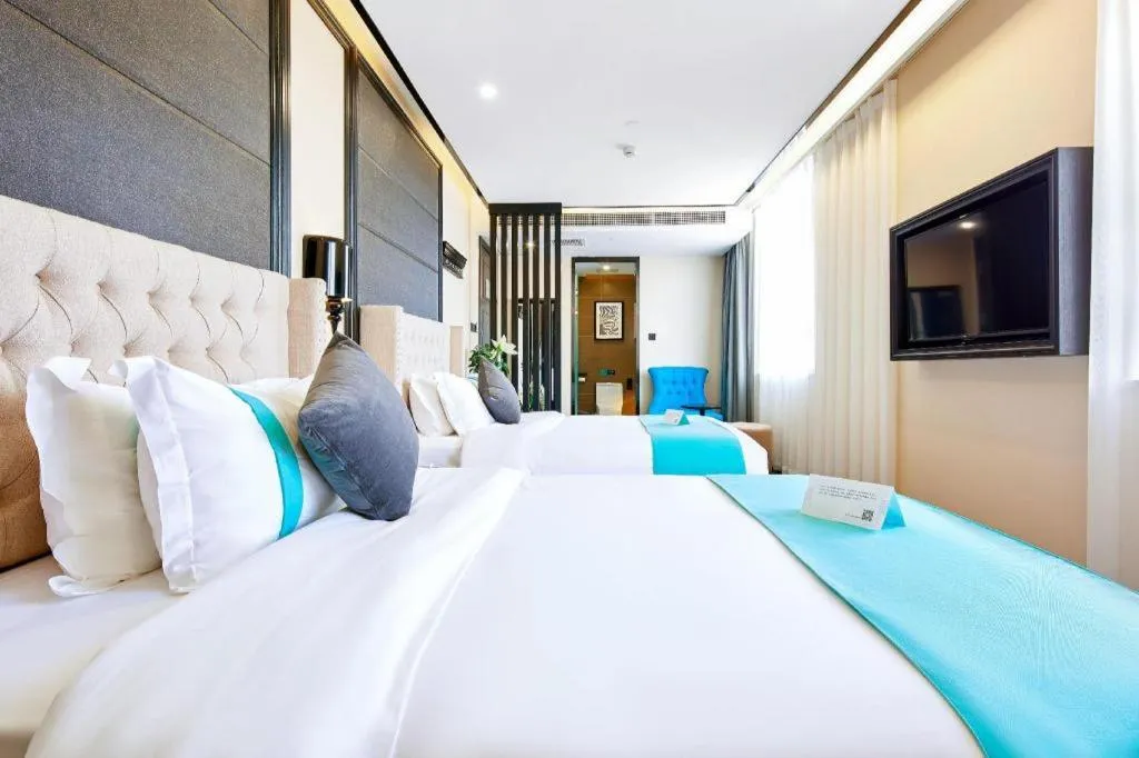Bed in Xana Lite Hotelle Tianjin Huaming Binhai International Airport