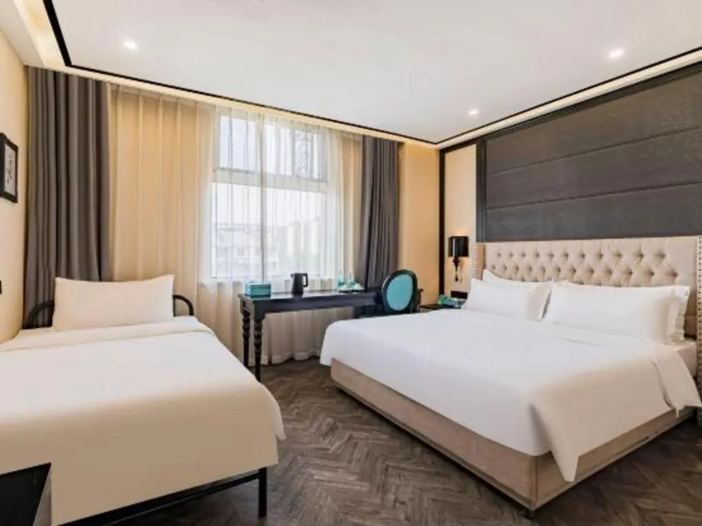 Bed in Xana Lite Hotelle Tianjin Huaming Binhai International Airport
