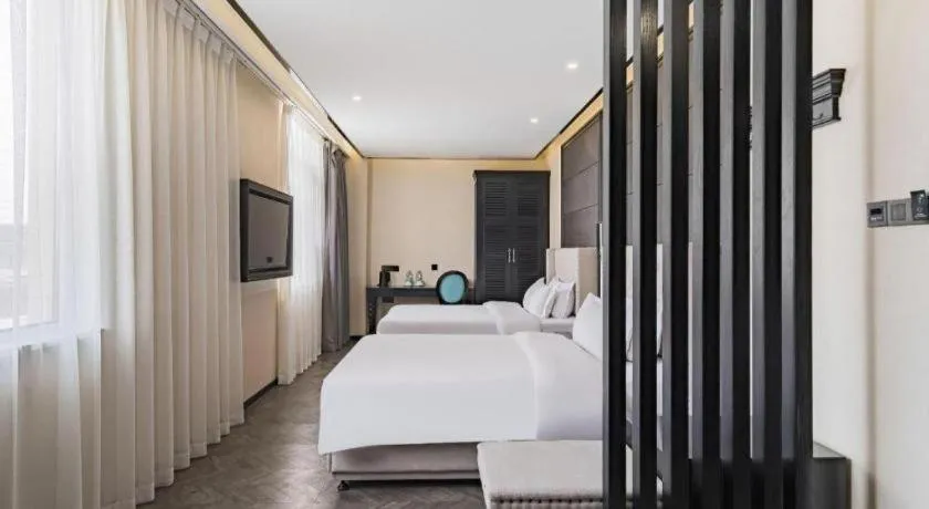 Bed in Xana Lite Hotelle Tianjin Huaming Binhai International Airport