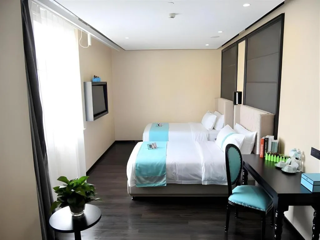 Bed in Xana Lite Hotelle Tianjin Huaming Binhai International Airport