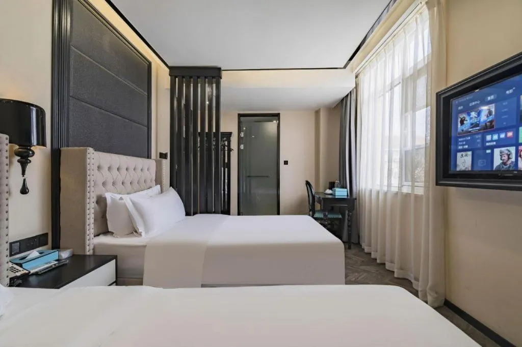 Bed in Xana Lite Hotelle Tianjin Huaming Binhai International Airport