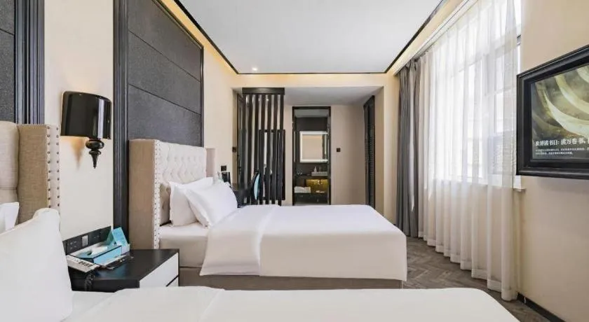 Bed in Xana Lite Hotelle Tianjin Huaming Binhai International Airport