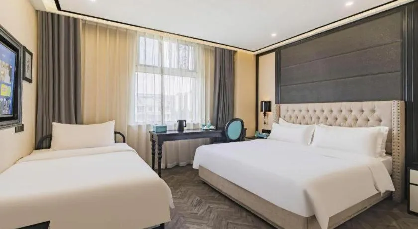 Bed in Xana Lite Hotelle Tianjin Huaming Binhai International Airport
