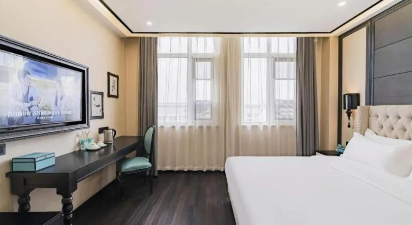 Bed in Xana Lite Hotelle Tianjin Huaming Binhai International Airport