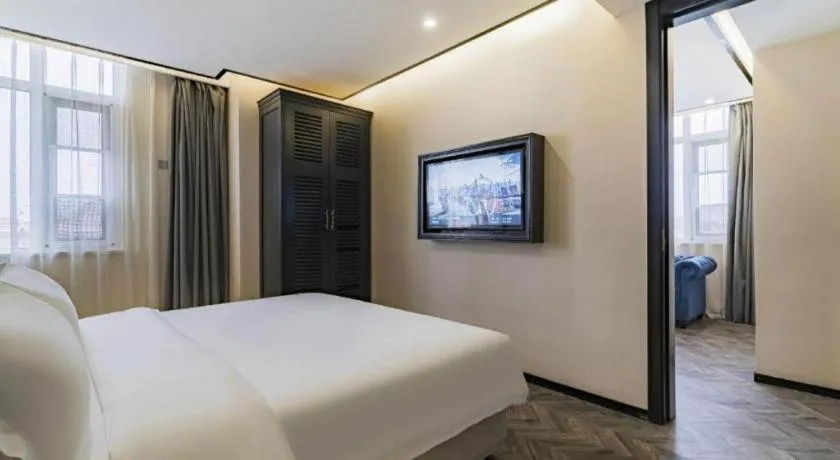 Bed in Xana Lite Hotelle Tianjin Huaming Binhai International Airport