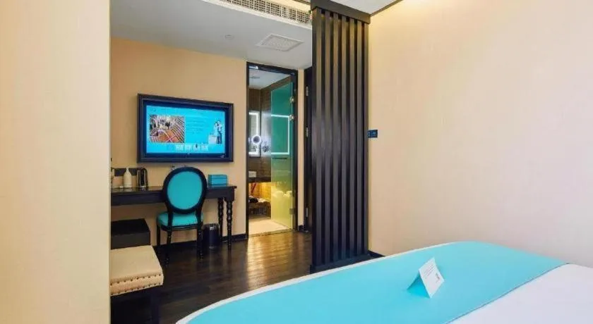 Bed in Xana Lite Hotelle Tianjin Huaming Binhai International Airport