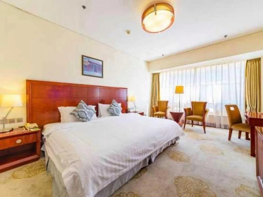 Bed in Jinjiang Hotel Qianan