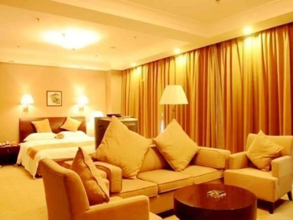 Bed in Jinjiang Hotel Qianan