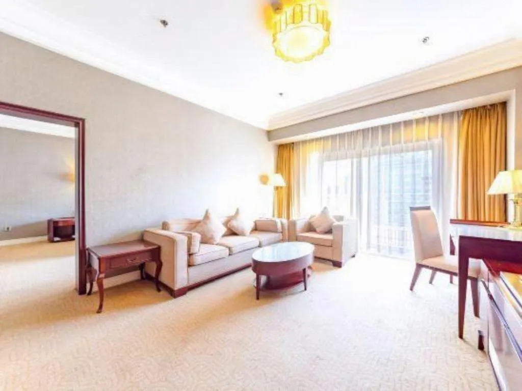 Bed in Jinjiang Hotel Qianan