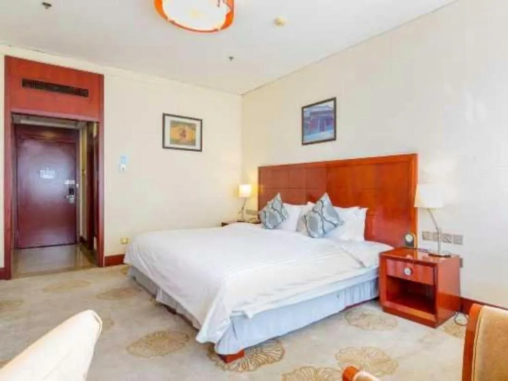 Bed in Jinjiang Hotel Qianan