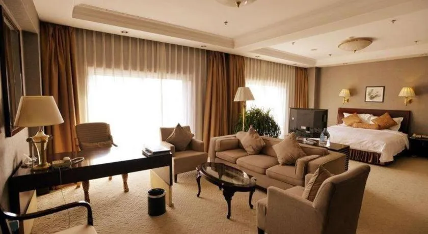 Bed in Jinjiang Hotel Qianan