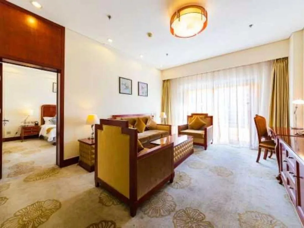 Bed in Jinjiang Hotel Qianan