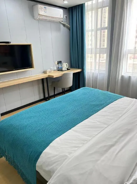 Bed in Shell Hotel Taixing Huangqiao Town Dinghui Road