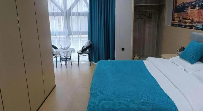 Bed in Shell Hotel Taixing Huangqiao Town Dinghui Road