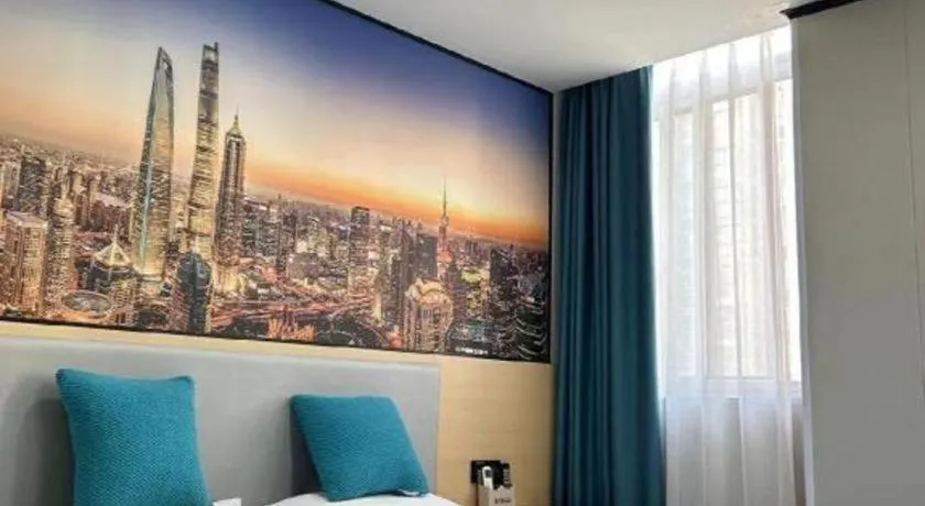 Bed in Shell Hotel Taixing Huangqiao Town Dinghui Road