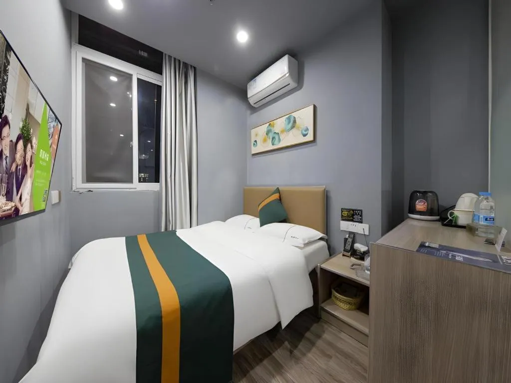 Bed in Shell Hotel Taixing Huangqiao Town Dinghui Road