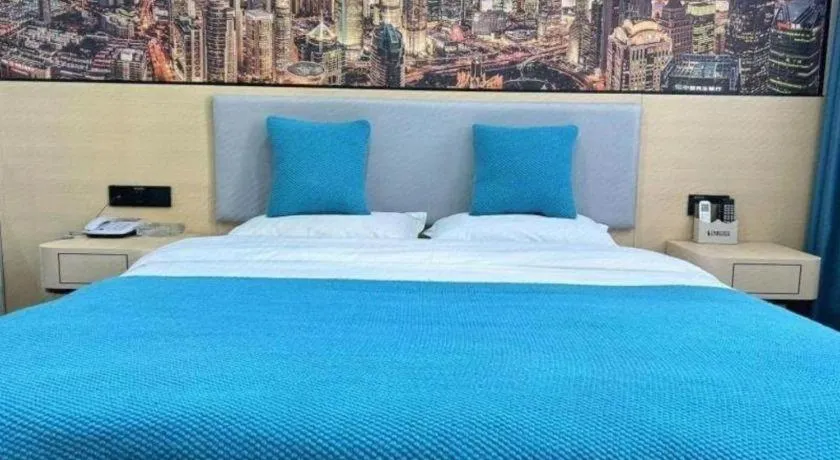 Bed in Shell Hotel Taixing Huangqiao Town Dinghui Road