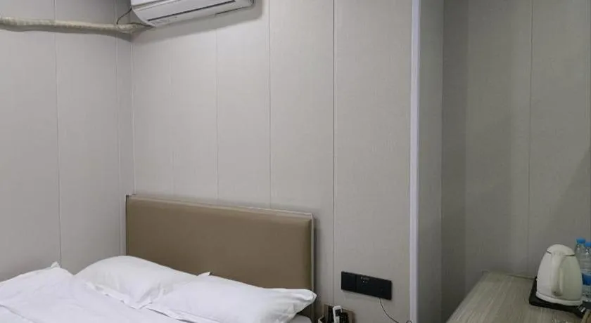 Bed in Shell Hotel Taixing Huangqiao Town Dinghui Road