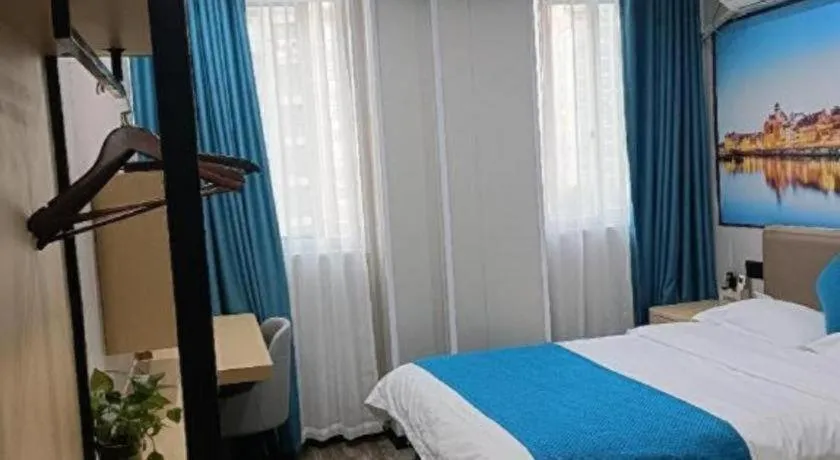 Bed in Shell Hotel Taixing Huangqiao Town Dinghui Road