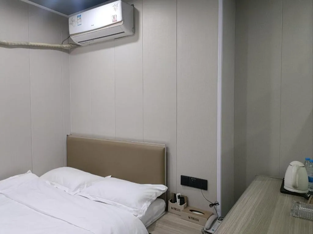 Bed in Shell Hotel Taixing Huangqiao Town Dinghui Road