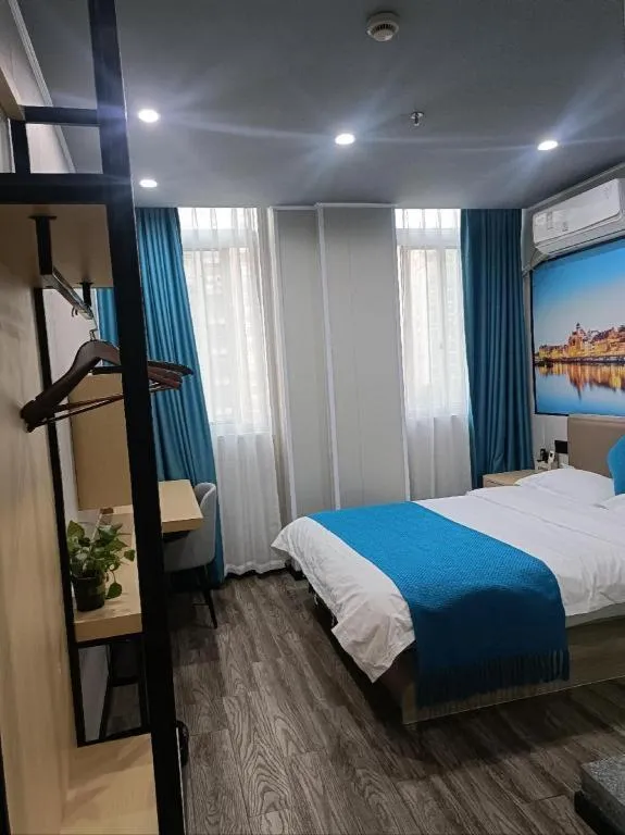 Bed in Shell Hotel Taixing Huangqiao Town Dinghui Road