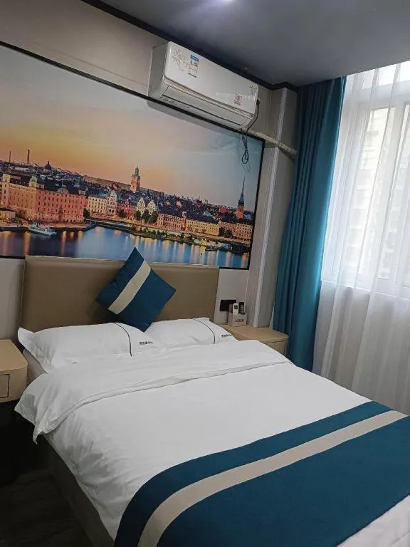 Bed in Shell Hotel Taixing Huangqiao Town Dinghui Road