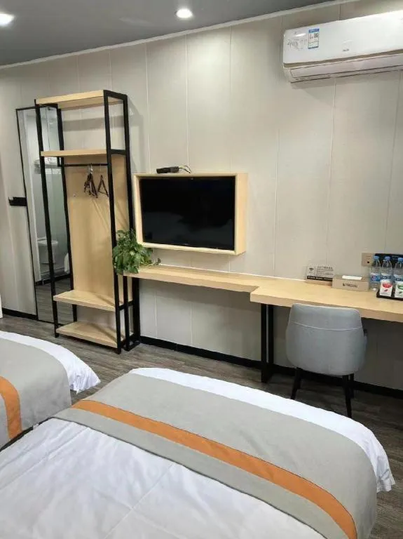 Bed in Shell Hotel Taixing Huangqiao Town Dinghui Road