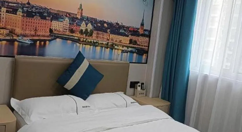 Bed in Shell Hotel Taixing Huangqiao Town Dinghui Road