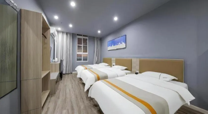 Bed in Shell Hotel Taixing Huangqiao Town Dinghui Road