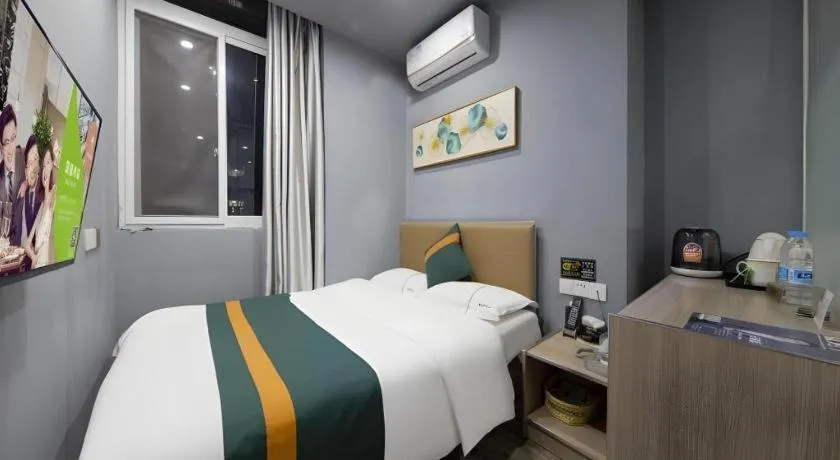 Bed in Shell Hotel Taixing Huangqiao Town Dinghui Road