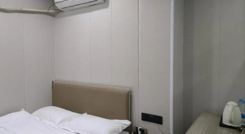Bed in Shell Hotel Taixing Huangqiao Town Dinghui Road