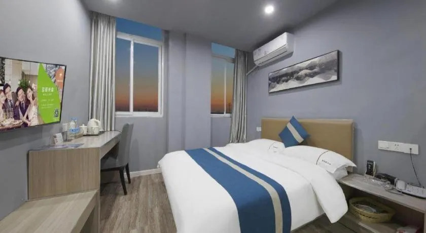 Bed in Shell Hotel Taixing Huangqiao Town Dinghui Road