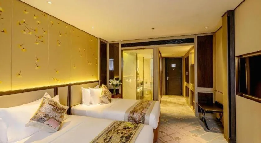 Bed in Dahe Jinjiang Hotel