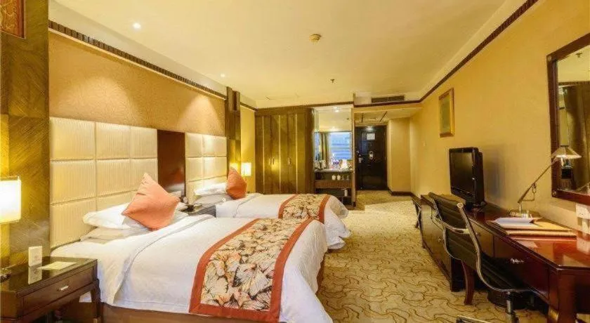 Bed in Dahe Jinjiang Hotel