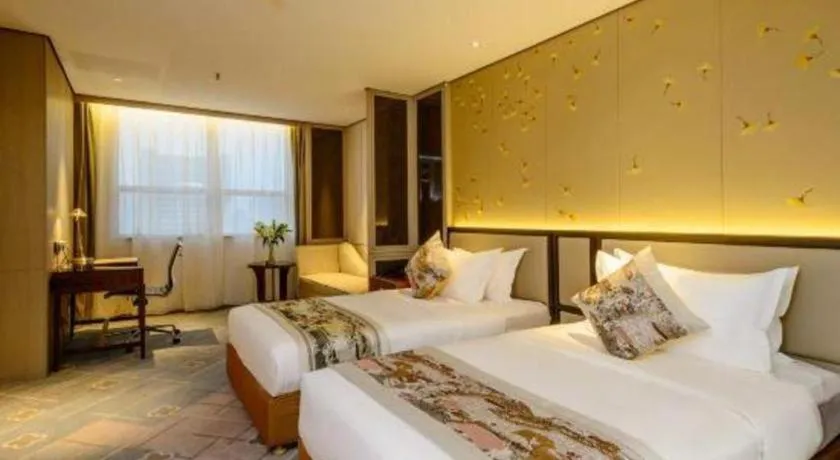 Bed in Dahe Jinjiang Hotel