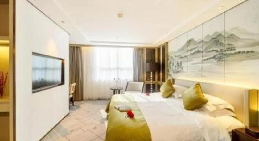 Bed in Dahe Jinjiang Hotel