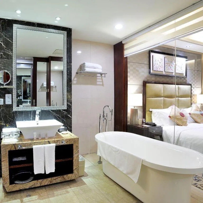 Bed in Dahe Jinjiang Hotel