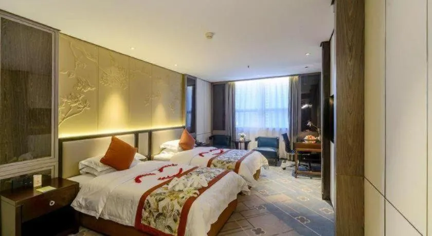 Bed in Dahe Jinjiang Hotel