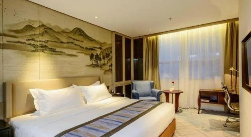 Bed in Dahe Jinjiang Hotel