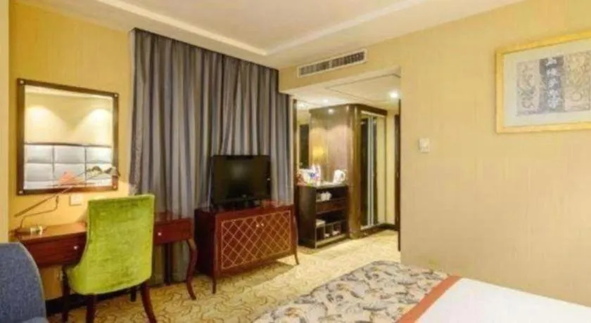 Bed in Dahe Jinjiang Hotel