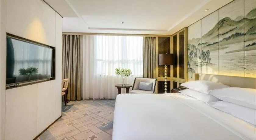 Bed in Dahe Jinjiang Hotel