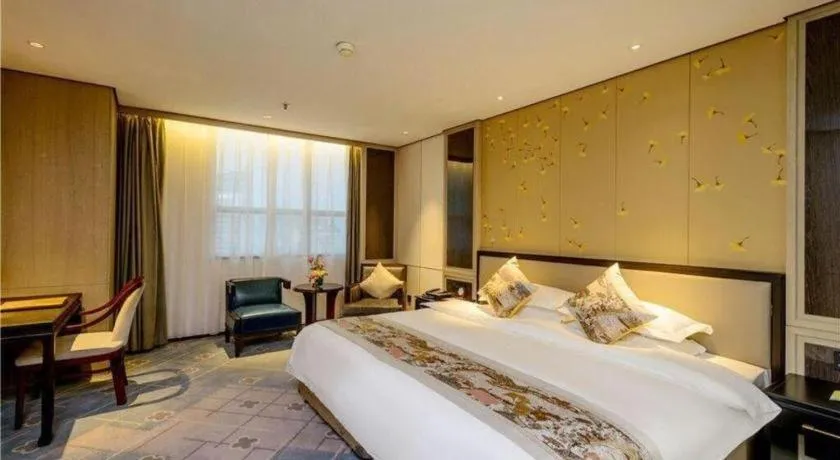 Bed in Dahe Jinjiang Hotel