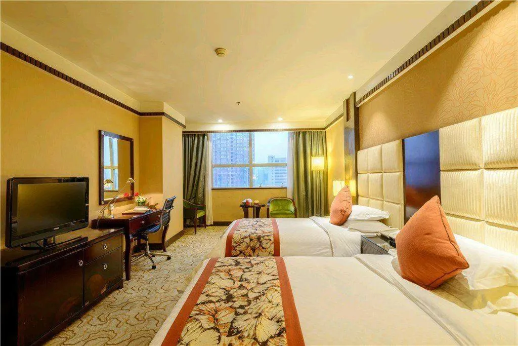 Bed in Dahe Jinjiang Hotel
