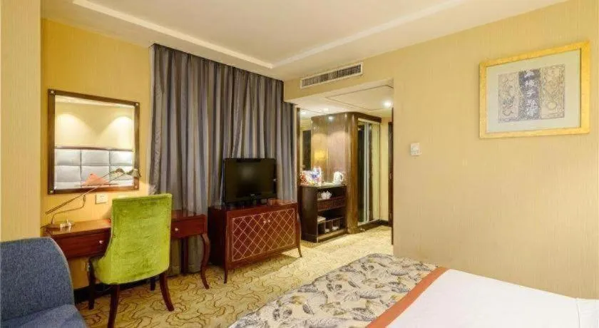 Bed in Dahe Jinjiang Hotel