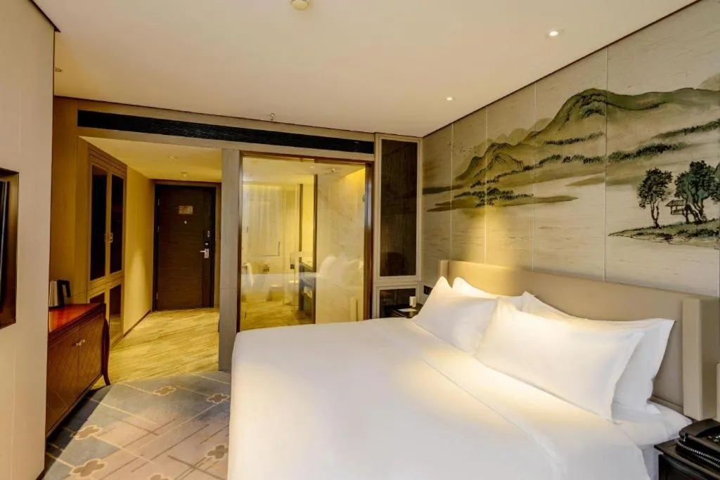 Bed in Dahe Jinjiang Hotel