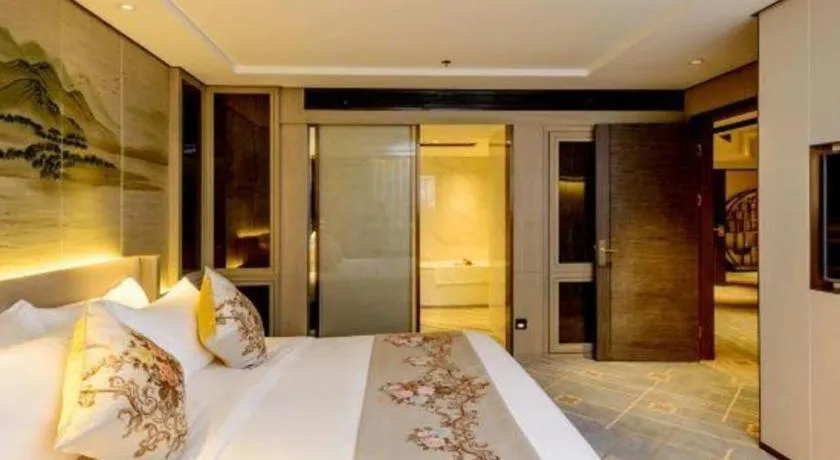 Bed in Dahe Jinjiang Hotel