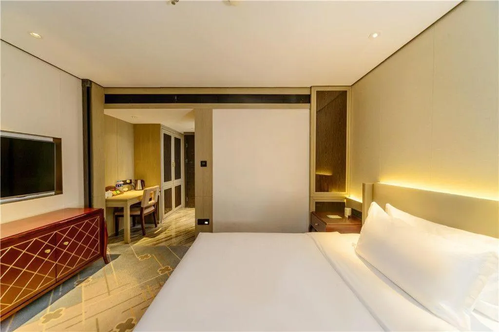 Bed in Dahe Jinjiang Hotel