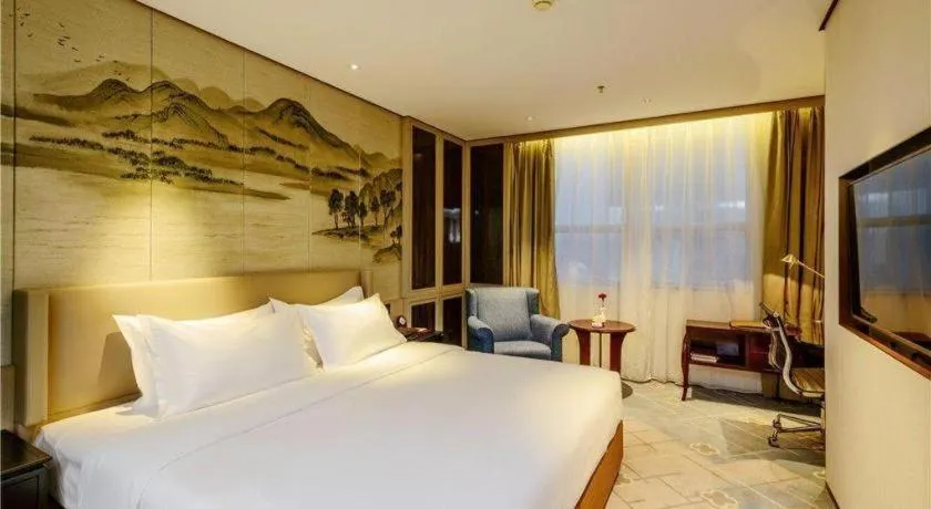 Bed in Dahe Jinjiang Hotel